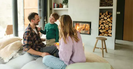 Quality time of family near the fireplace
