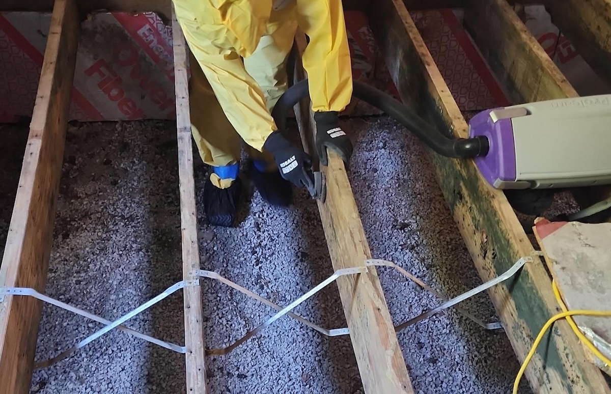 Monarch Restoration specialists drying wood frame with specialized equipment.